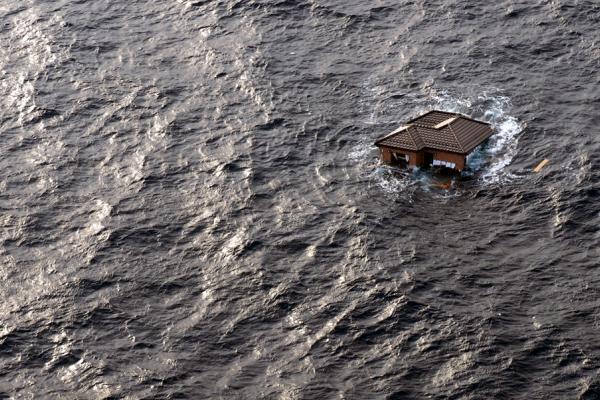 House Drifting in the Sea after Tsunami Hits Japan