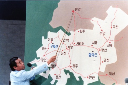 man pointing to map