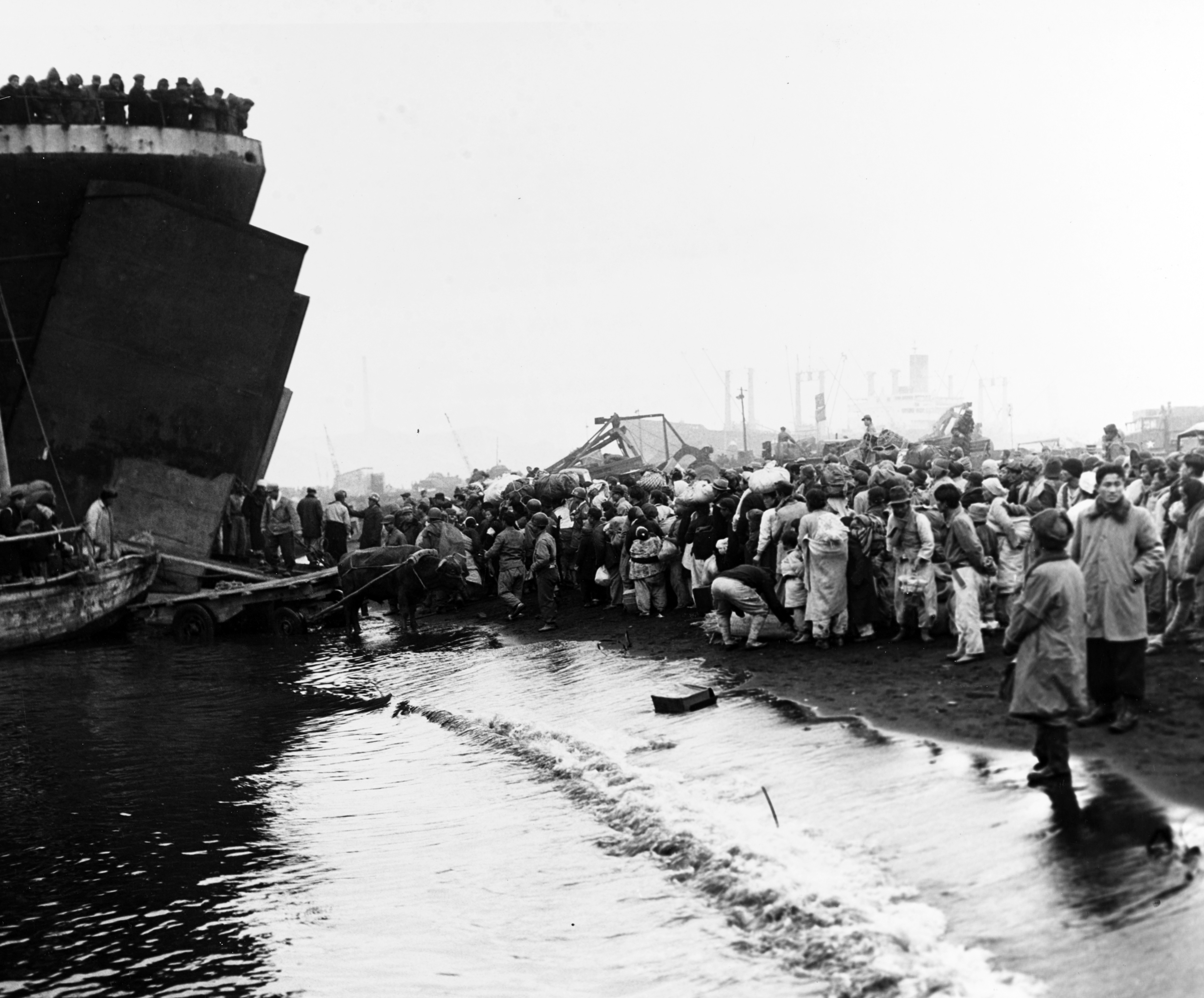 people evacuating on a ship