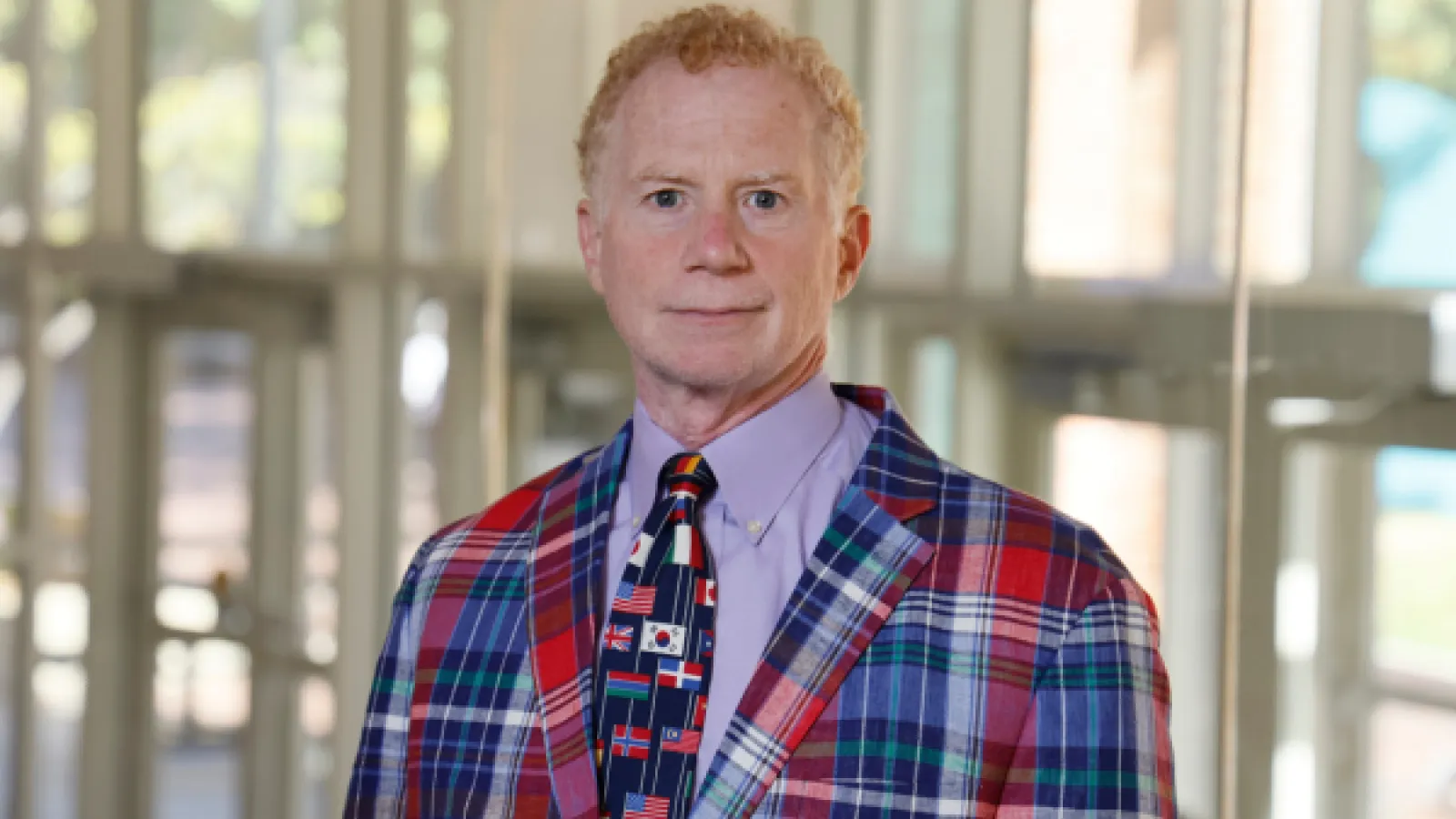 Mitch Lerner in plaid suit 
