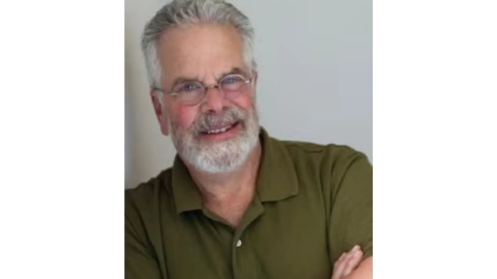 picture of older man with white hair and glasses