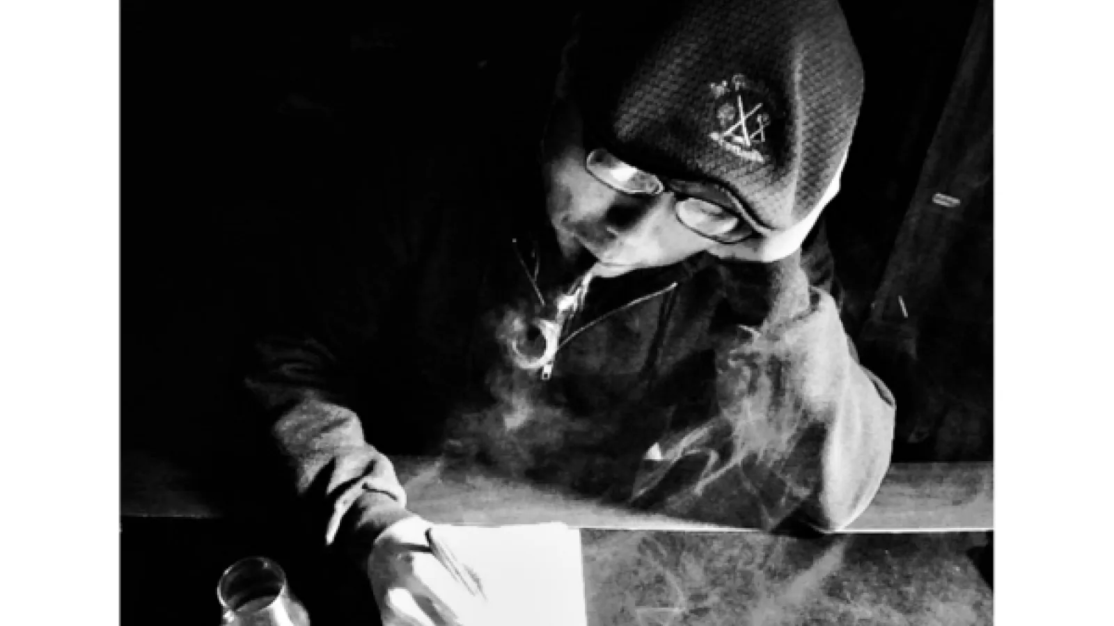 Photo of person smoking a pipe