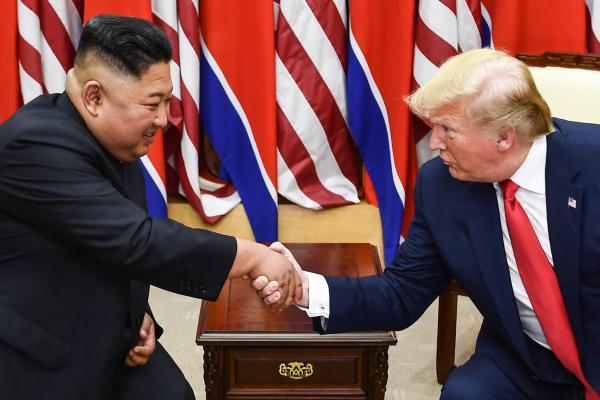 Image of Kim Jung Un and Donald Trump shaking hands