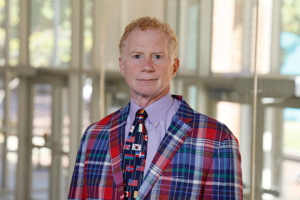 Mitch Lerner in plaid suit 