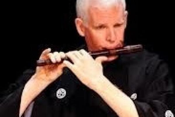 David Crandall playing flute David Crandall playing flute