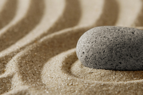 Japanese zen garden rock in sand