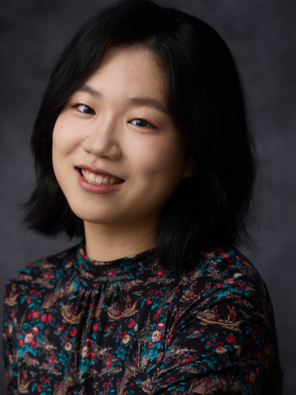 Picture of young woman with shoulder length black hair
